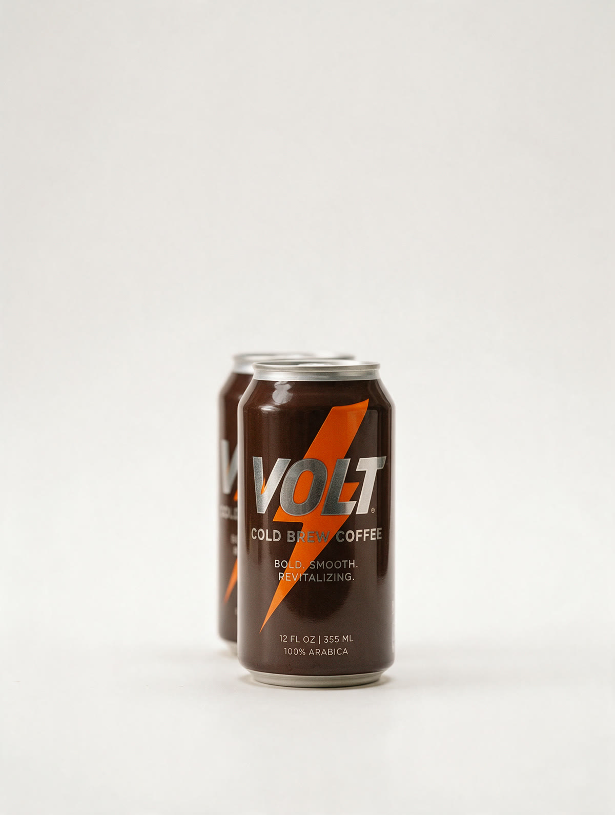 Two Volt cold brew cans wrapped edge to edge in printed shrink sleeves